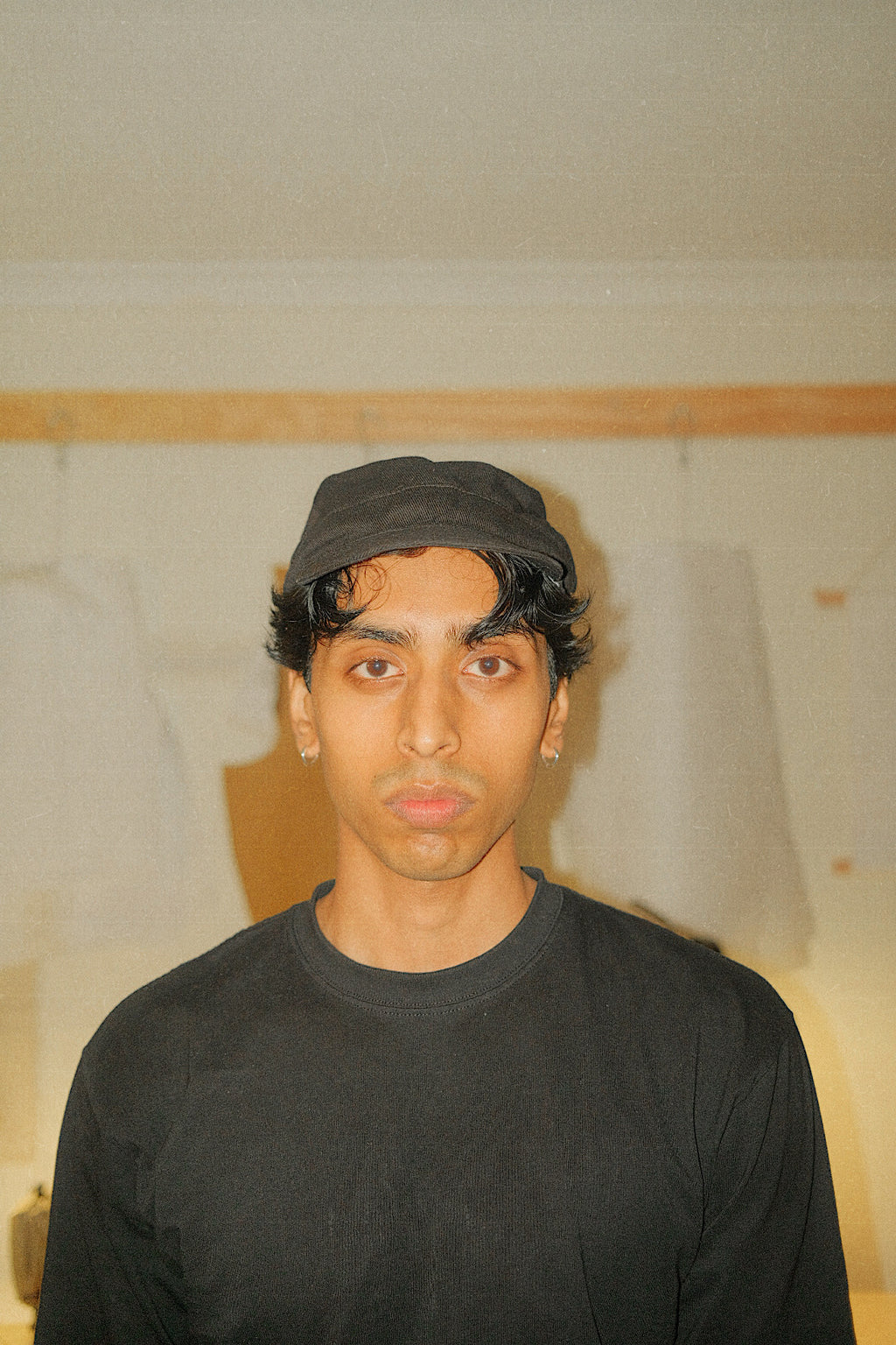 Front profile of Button Hat on head