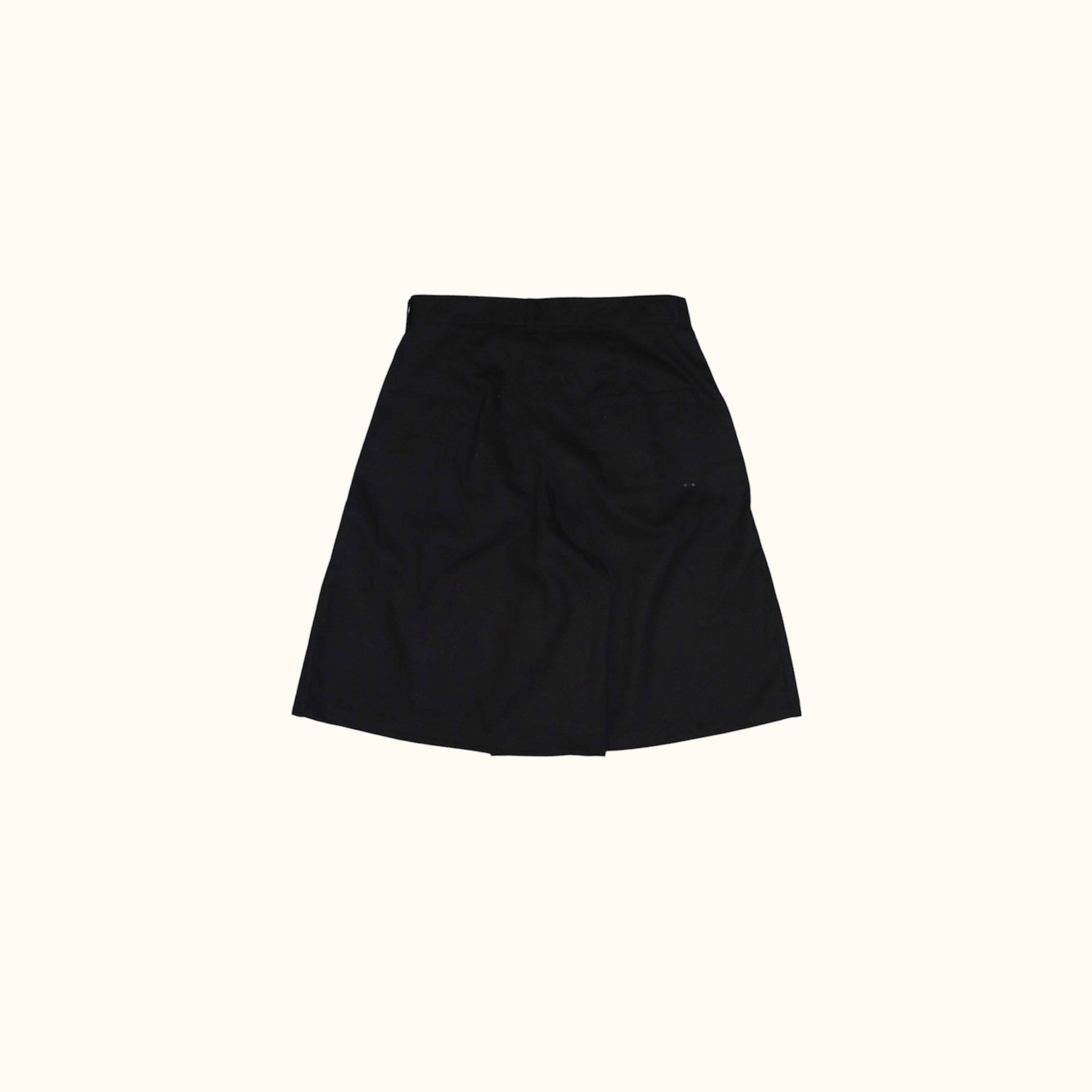 Back flat lay of College Pleated Short showcasing rear darts and pocket