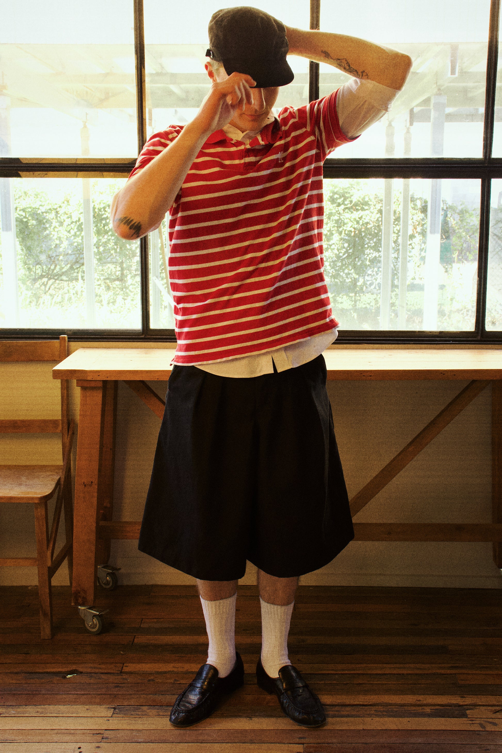 Dylan styled in our College Pleated Shorts