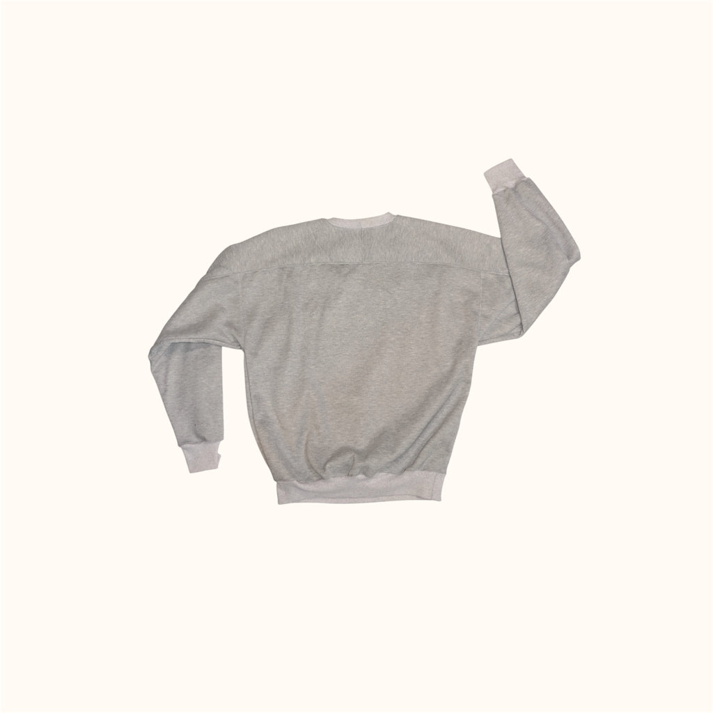 Back flatlay of our Pocket Sweatshirt