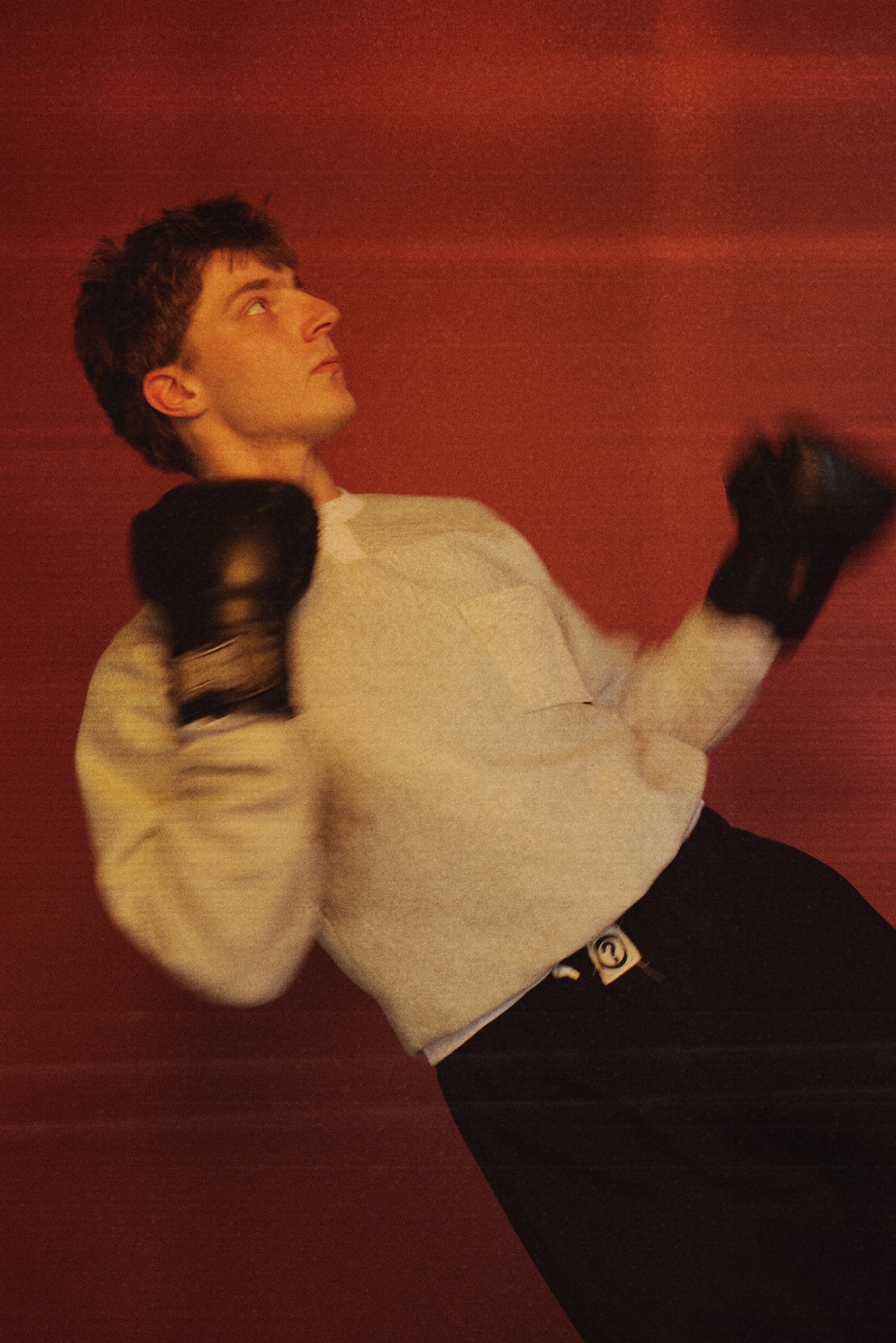 Dylan styled in our Pocket Sweatshirt with a boxing/sportswear aesthetic
