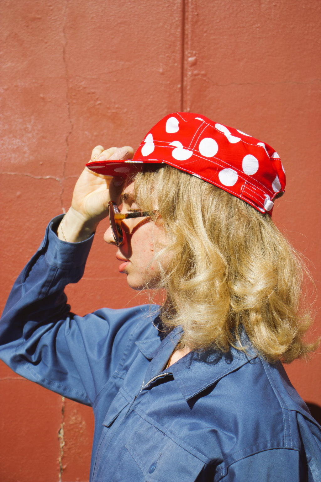 Elise wearing our Polka Dot Hat showcasing side profile