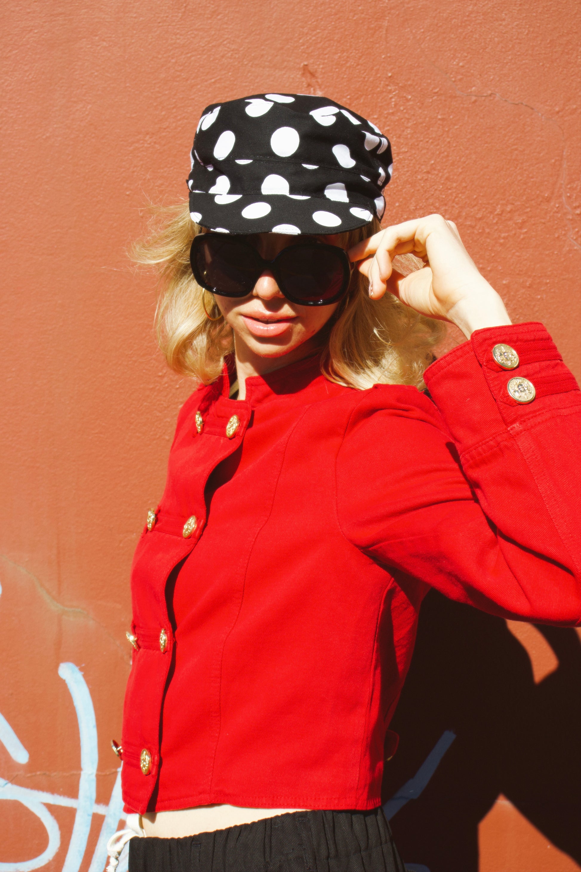 Elise wearing our Polka Dot Hat showcasing front profile