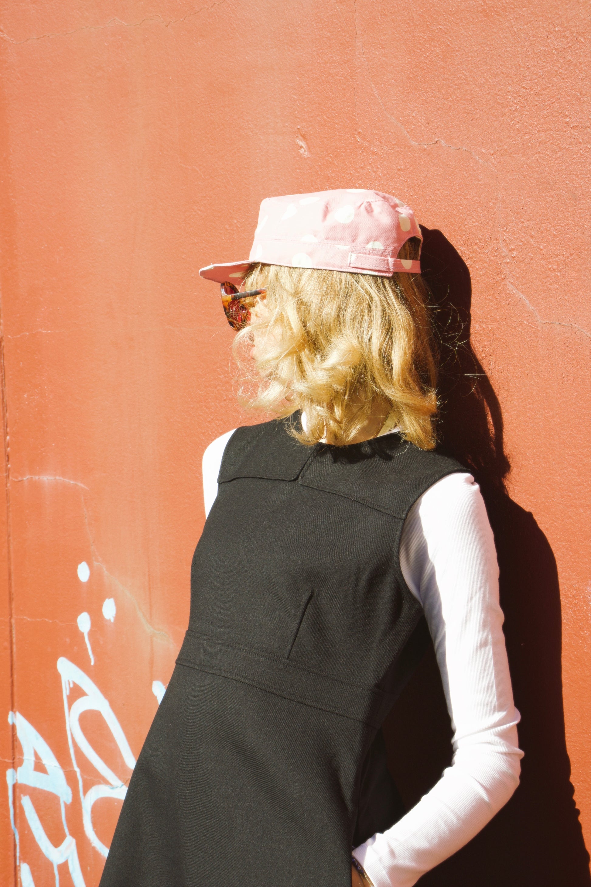 Elise wearing our Polka Dot Hat showcasing side profile
