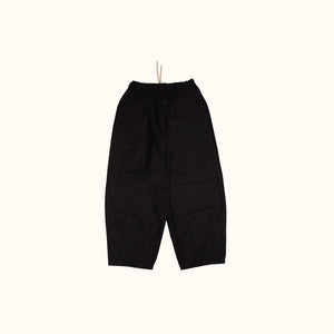 Front flay lay of our Studio Pants. Highlighting the four front patch pockets, elastic waistband and balloon shape.