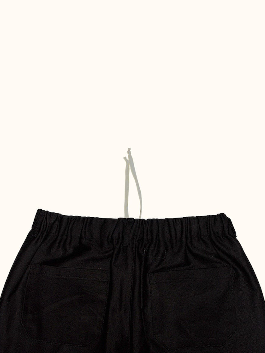 Close up of the elasticated waistband on the Studio Pants